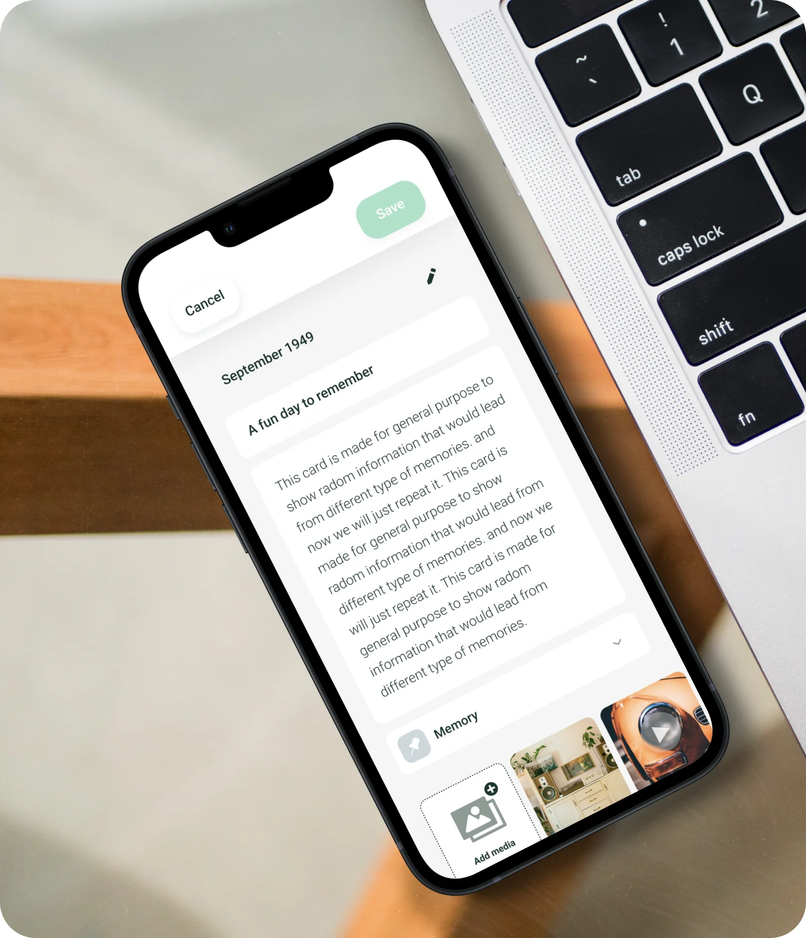 A phone on a laptop keyboard, editing a memory in the Relefant app